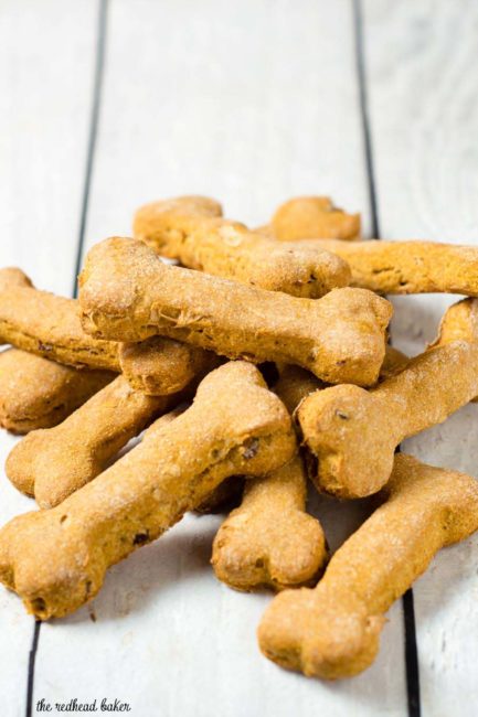 Pumpkin apple dog biscuits are a healthy, crunchy treat for your furry friend. Substitute almond flour for the wheat flour if your dog can't have grains.