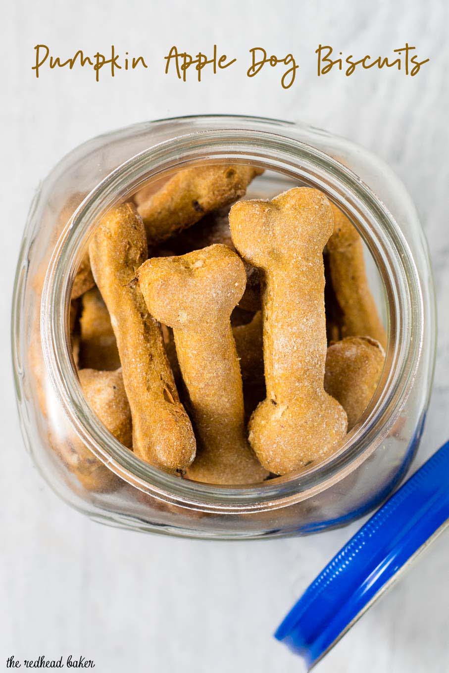 Pumpkin apple dog biscuits are a healthy, crunchy treat for your furry friend. Substitute almond flour for the wheat flour if your dog can't have grains.