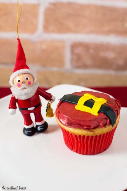 Use this tutorial to learn how to make Santa Claus Cupcakes! These easy cupcakes are a festive addition to any Christmas party or dinner. #NationalCupcakeDay