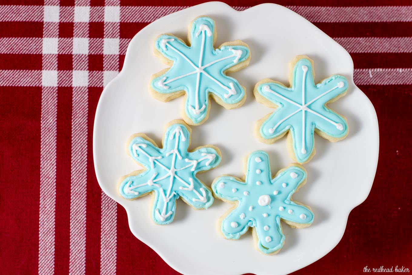 Let it snow with these adorable snowflake cookies! Perfect for any winter party, decorate each in a unique pattern, just like real snowflakes!  #ChristmasCookies