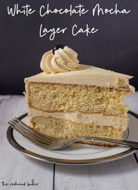 A side view of a slice of white chocolate mocha layer cake.