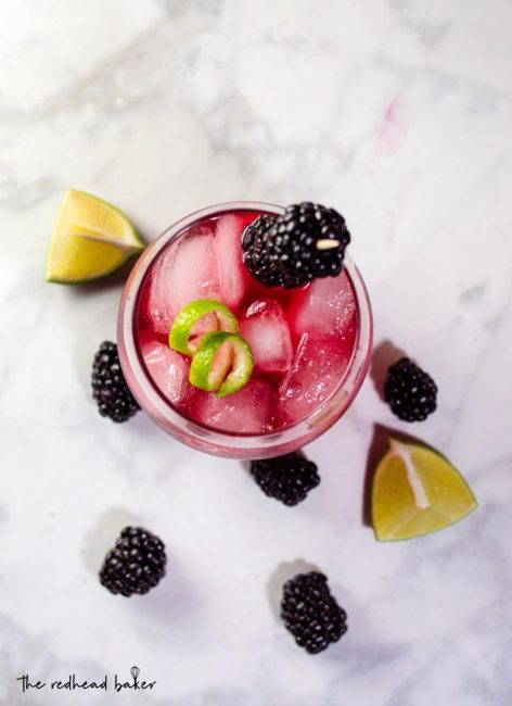 Blackberry lime margaritas have a vibrant color and delicious flavor. Adding lime zest to the simple syrup ensures that the blackberry doesn't overpower the drink's flavor. 
