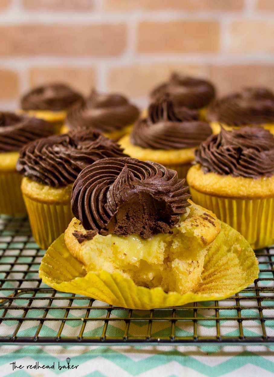 Boston cream cupcakes have all the flavors of Boston Cream Pie in cupcake form: buttery yellow cake, vanilla pastry cream filling, and rich chocolate ganache frosting.