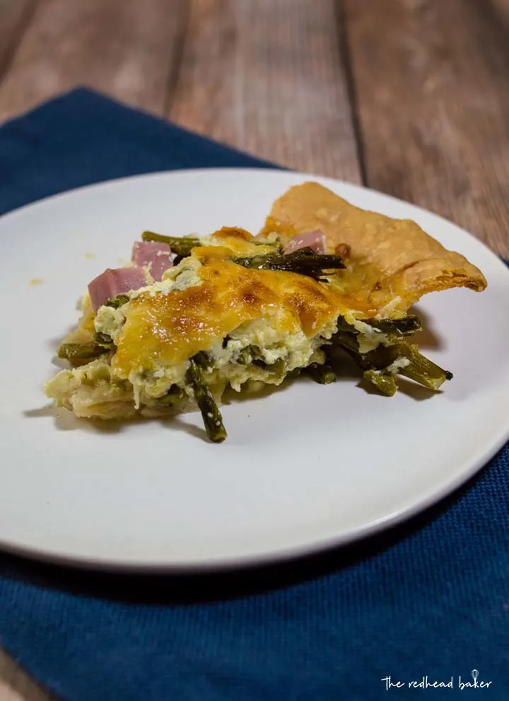 This ham, asparagus and gruyere quiche is ideal for brunch for a crowd: it should be made ahead, can be served at room temperature, and it's delicious!