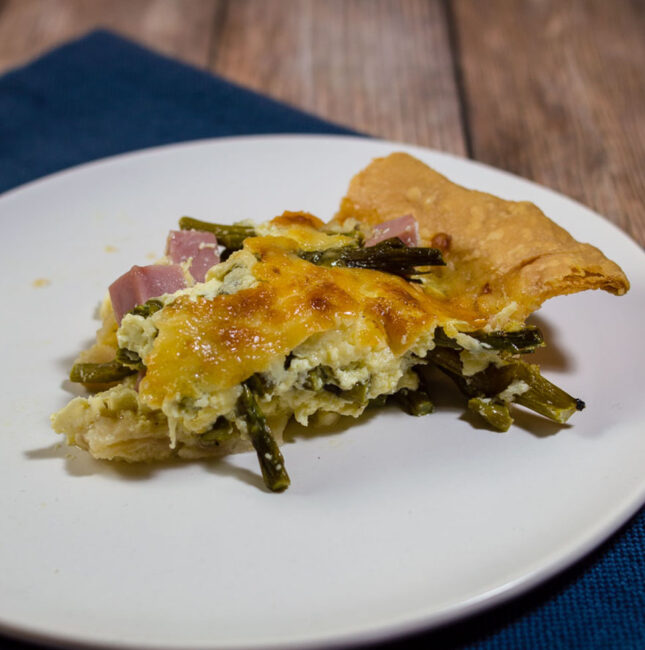 This ham, asparagus and gruyere quiche is ideal for brunch for a crowd: it should be made ahead, can be served at room temperature, and it's delicious!