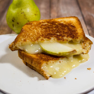 This gourmet grilled cheese sandwich with taleggio cheese and thin slices of pear is the perfect way to celebrate National Grilled Cheese Month!
