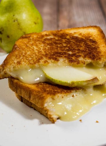 This gourmet grilled cheese sandwich with taleggio cheese and thin slices of pear is the perfect way to celebrate National Grilled Cheese Month!