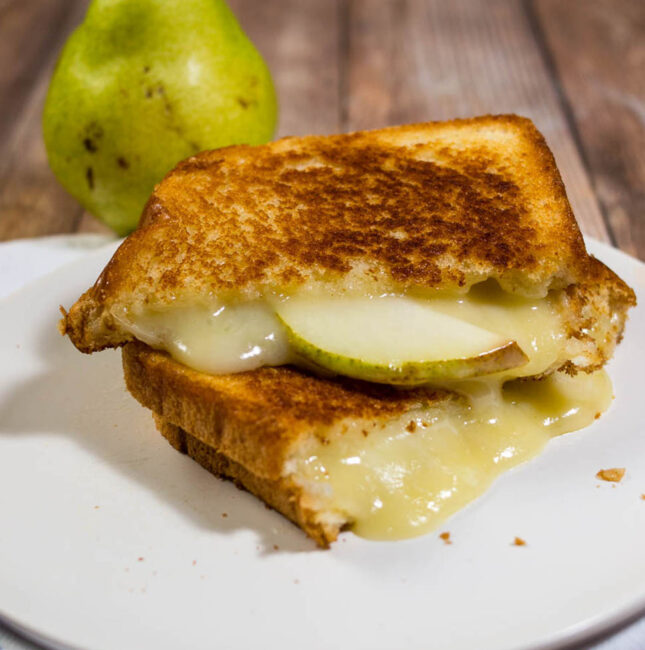 This gourmet grilled cheese sandwich with taleggio cheese and thin slices of pear is the perfect way to celebrate National Grilled Cheese Month!