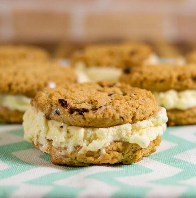 Cinnamon oatmeal cookie ice cream sandwiches pair homemade cinnamon ice cream between two soft oatmeal raisin cookies. You won't find this combination in your grocer's freezer! #ProgressiveEats