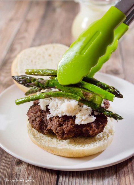 Surf-n-turf meets backyard cookout in these Oscar-Style Burgers. Hamburger patties are topped with crab meat, tender-crisp asparagus and rich Bearnaise sauce. #BurgerMonth