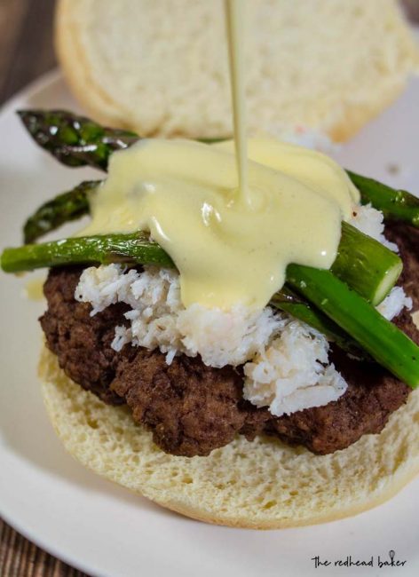 Surf-n-turf meets backyard cookout in these Oscar-Style Burgers. Hamburger patties are topped with crab meat, tender-crisp asparagus and rich Bearnaise sauce. #BurgerMonth