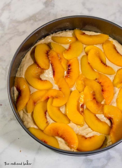 Peach brown butter coffee cake is loaded with peach slices and covered in cinnamon-spiced streusel crumbs. Enjoy it for brunch, dessert, or a snack any time of day!