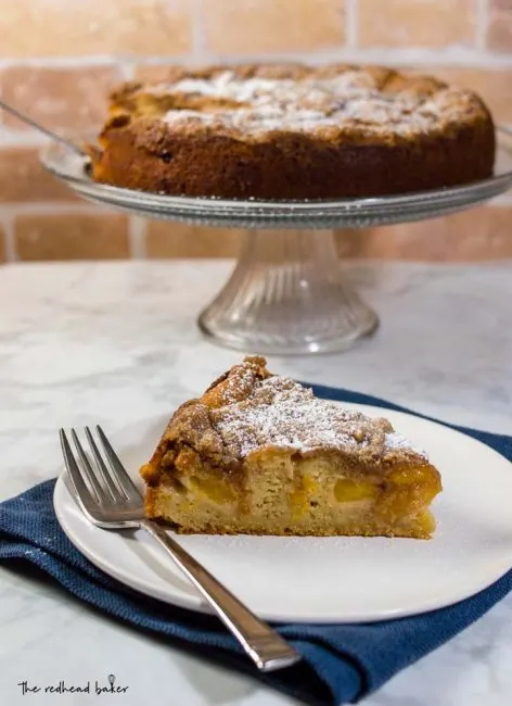 Peach brown butter coffee cake is loaded with peach slices and covered in cinnamon-spiced streusel crumbs. Enjoy it for brunch, dessert, or a snack any time of day!