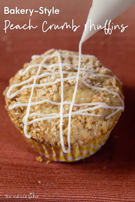 Icing being piped onto a bakery-style peach crumb muffin