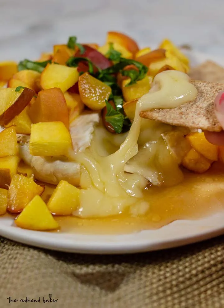 Think baked brie is only for winter holidays? Think again! Honey, basil and peach baked brie uses the freshest flavors of the summer to complement the buttery cheese. 