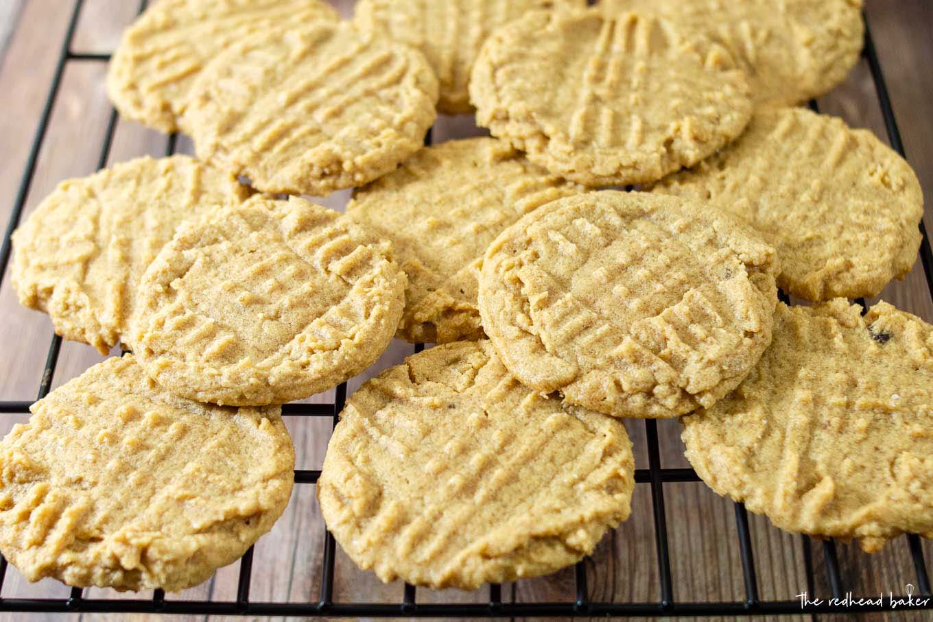 A cooling rack full of peanut butter cookies