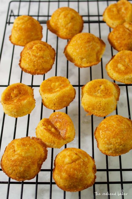 Baked apple cornbread cakelets cooling on a wire rack