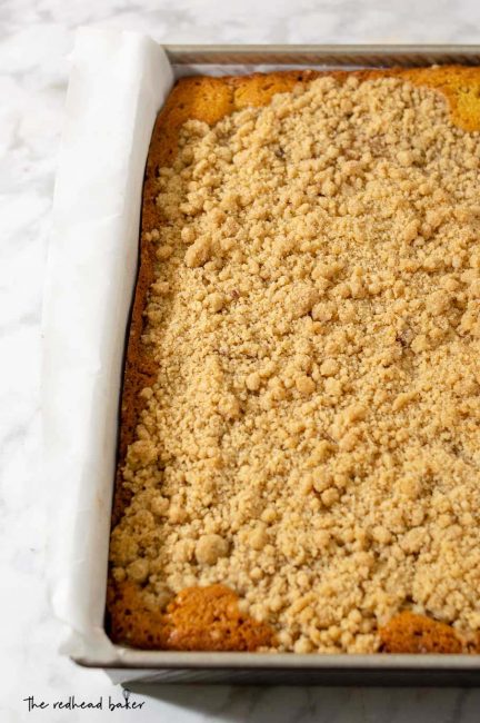 A cake pan of caramel apple crumb cake.