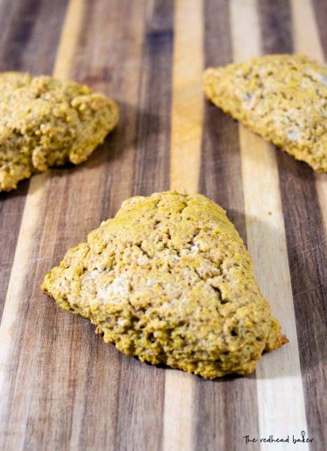 Three unglazed spiced pumpkin scones.