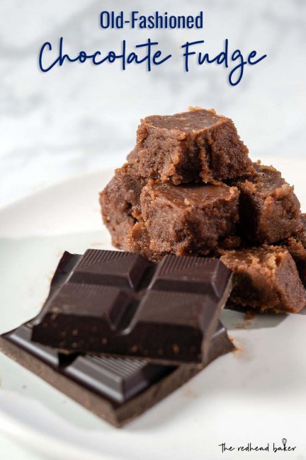 A pyramid of old-fashioned chocolate fudge next to unwrapped squares of Divine Chocolate 100% unsweetened baking chocolate