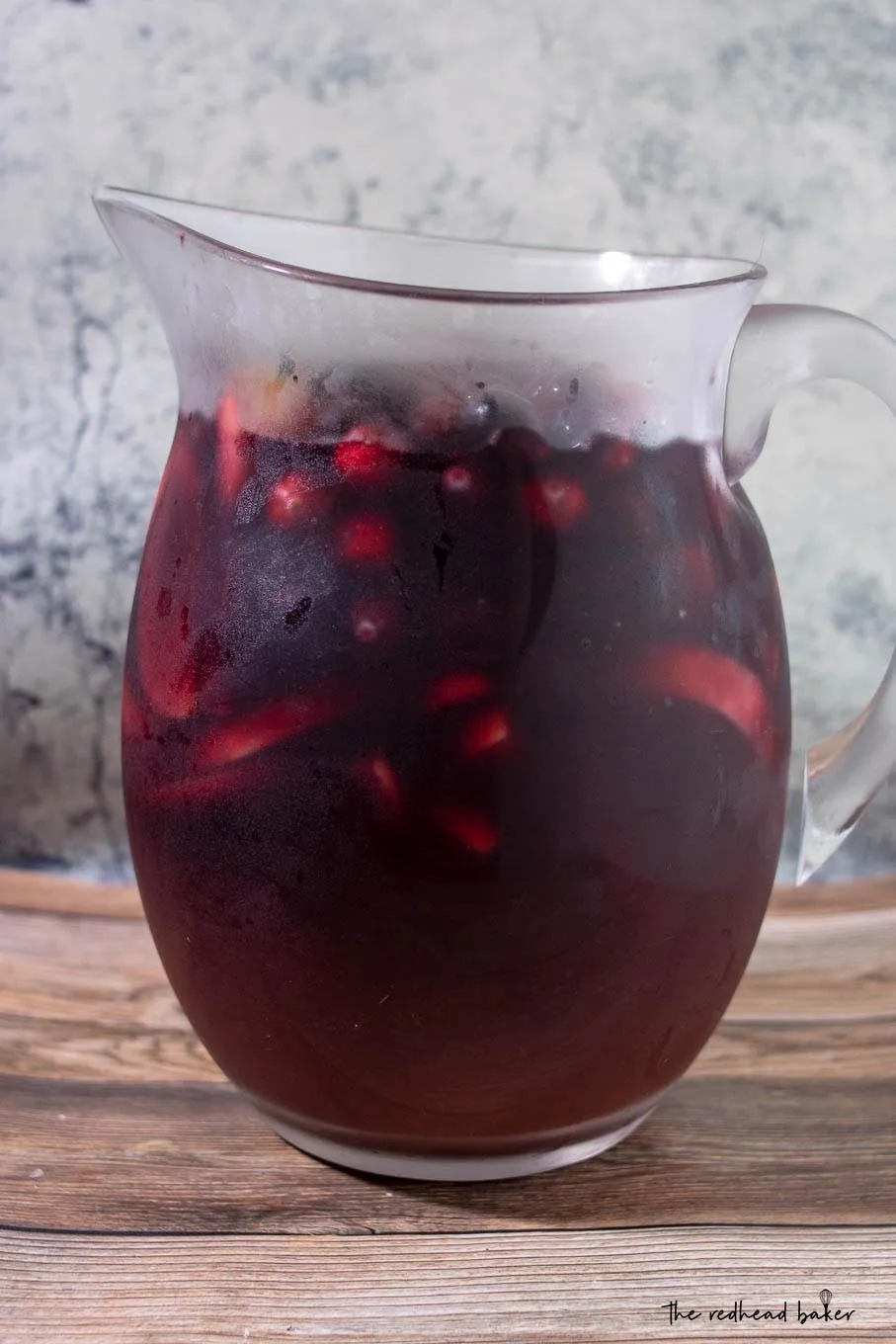A pitcher of cranberry apple sangria