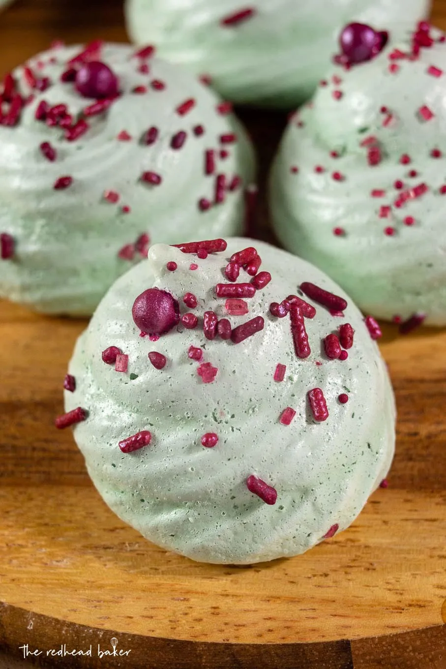 A close-up on a Christmas Tree meringue cookie