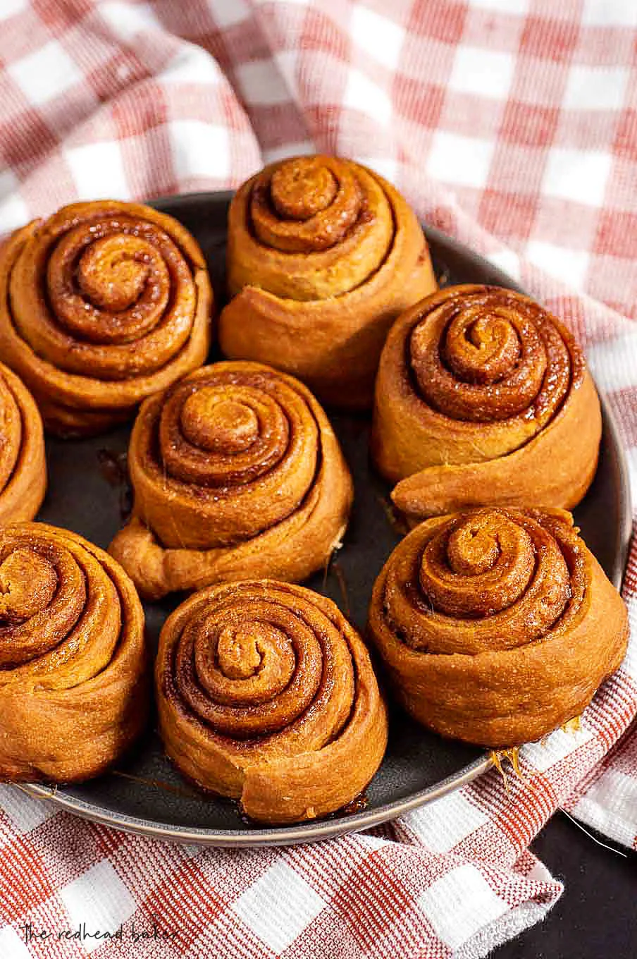 A plateful of un-iced gingerbread cinnamon rolls