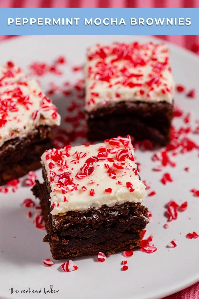 Peppermint mocha brownies are a fun, festive dessert! Fudgy chocolate mocha brownies are topped with white chocolate frosting and crushed peppermint.