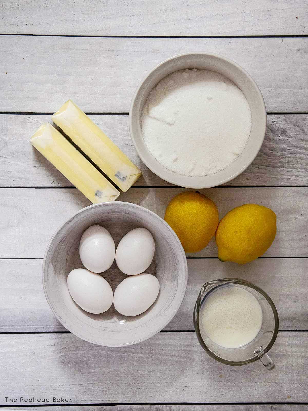 Lemon pound cake wet ingredients: sugar, butter, lemon zest and juice, buttermilk and eggs.