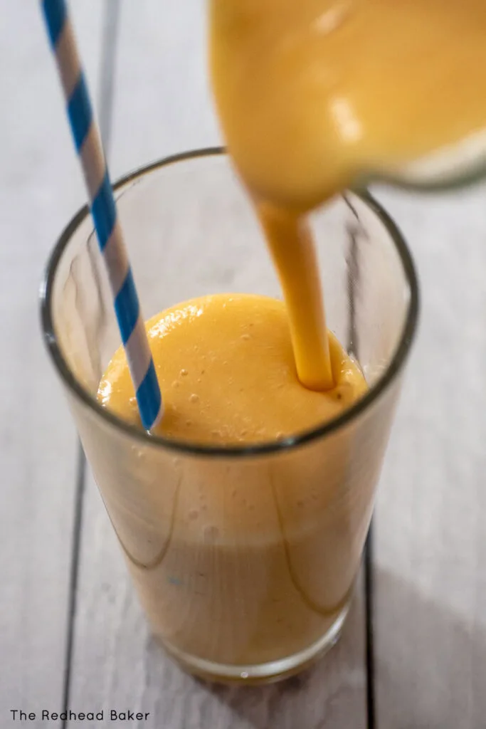 Smoothie being poured into a glass