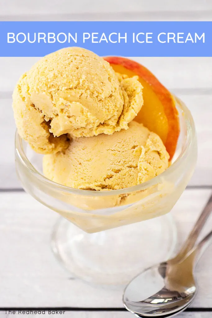 A close-up of two scoops of ice cream in a glass dish with a peach slice