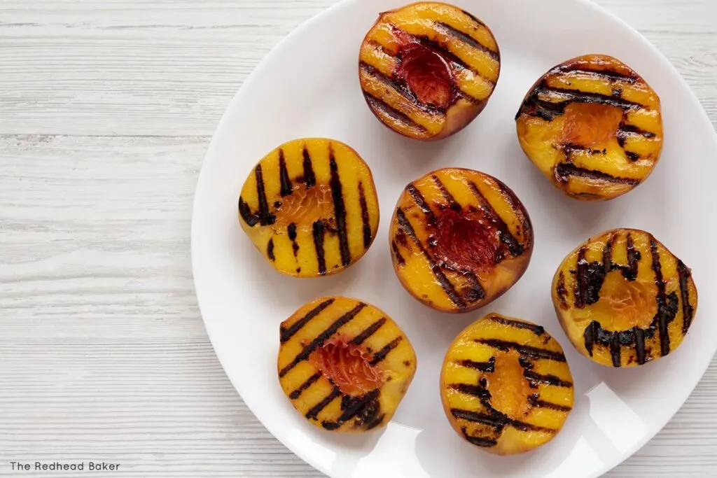 A plate of grilled nectarines and peaches