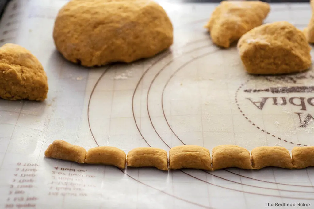 A rope of gnocchio dough, cut into 1-inch sections