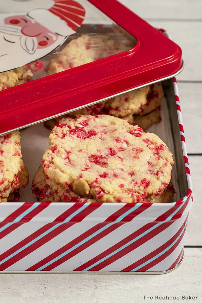Candy cane white chocolate cookies in a Christmas cookie tin