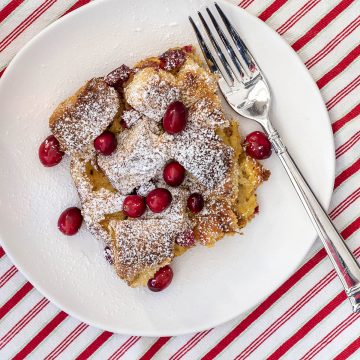 A dish of Cranberry Eggnog French Toast Bake