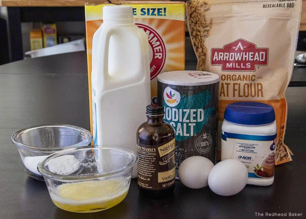 Ingredients needed to make oat flour pancakes: oat flour, buttermilk, baking soda, baking powder, salt, eggs, vanilla, sugar