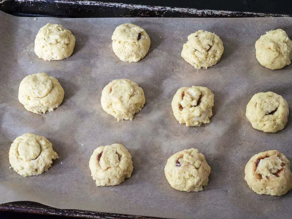 Filled dough balls with the jam covered.