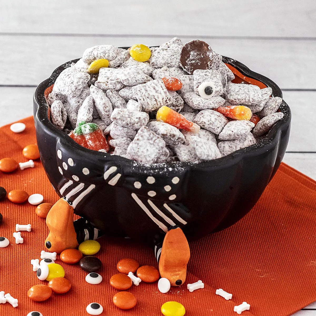 Halloween Muddy Buddies in a cauldron candy dish.