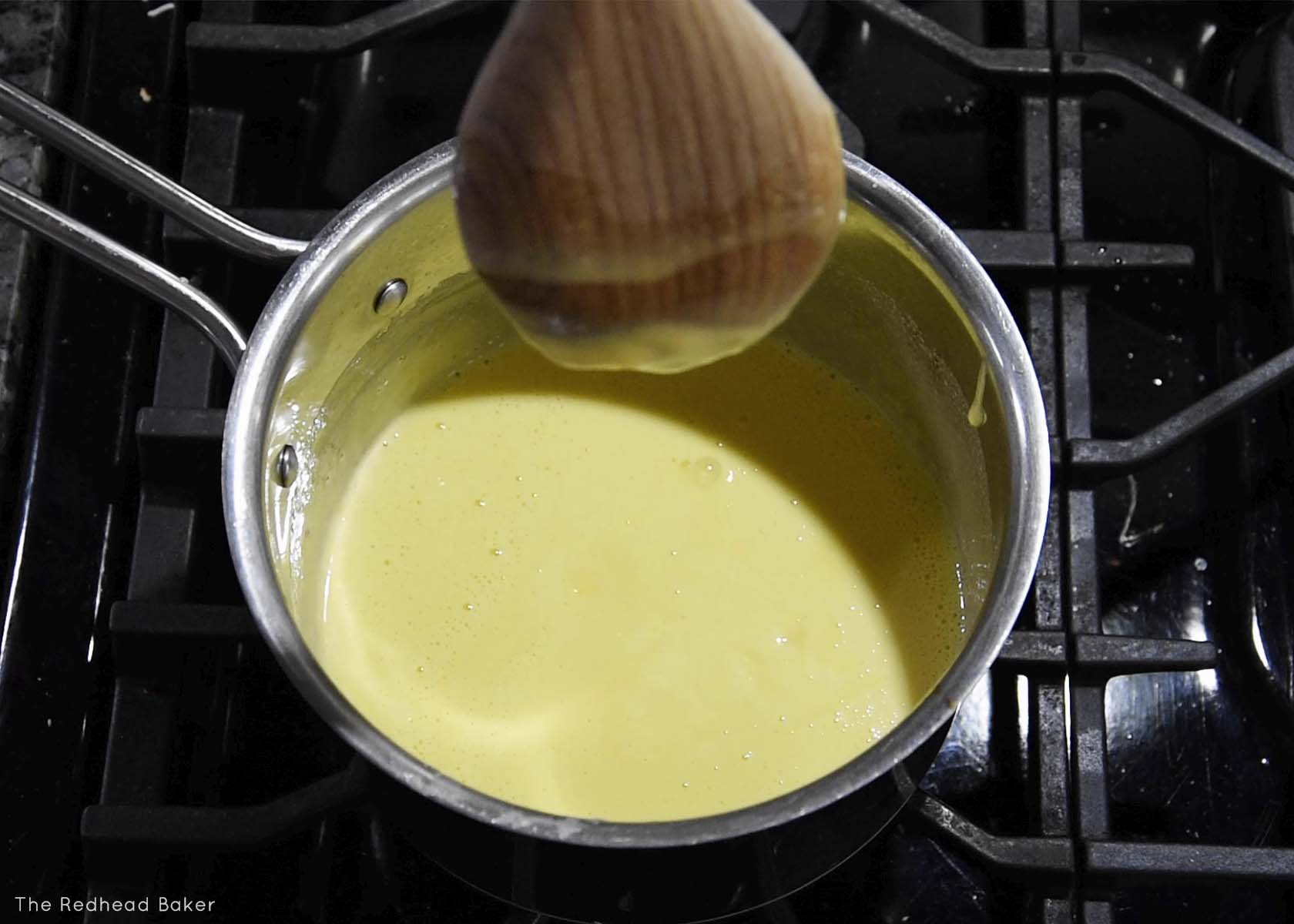 Properly cooked custard. The custard doesn't run when a finger is swiped across the back of the spoon.