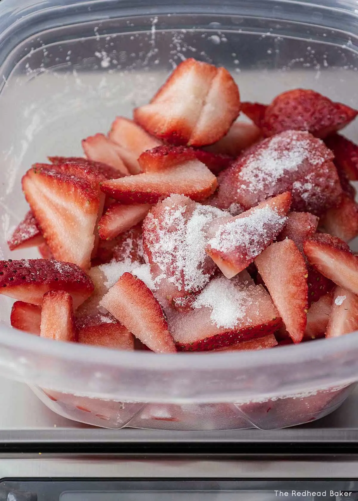 Sliced strawberries with sugar and lemon juice.