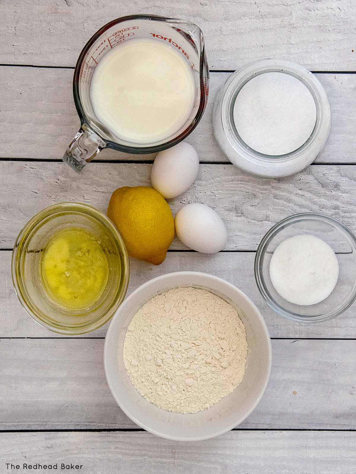 Ingredients for lemon crepes: milk, salt, eggs, lemon, butter, sugar and flour.